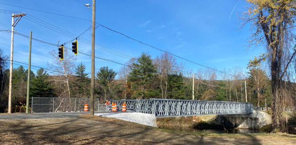 The newly installed, one-lane temporary bridge over Division Street.