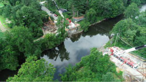 An aerial drone photo of the gap over the Housatonic River in Great Barrington, MA after the removal of the Division Street bridge.